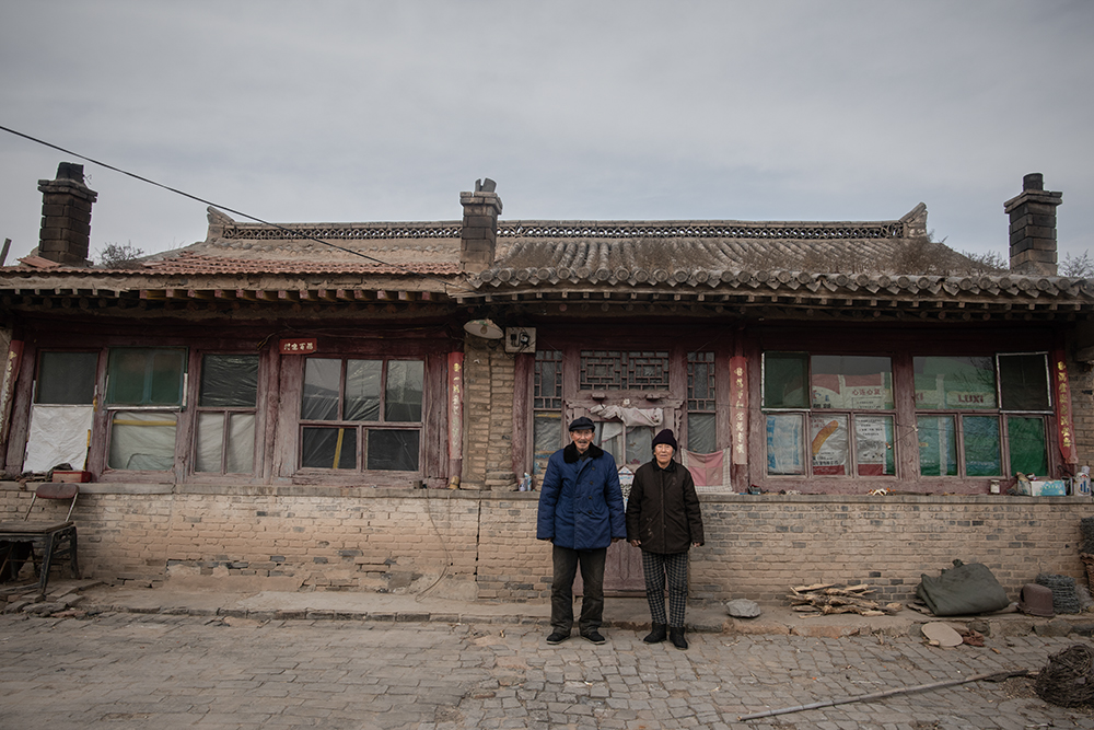 老房子的西屋曾经坍塌.