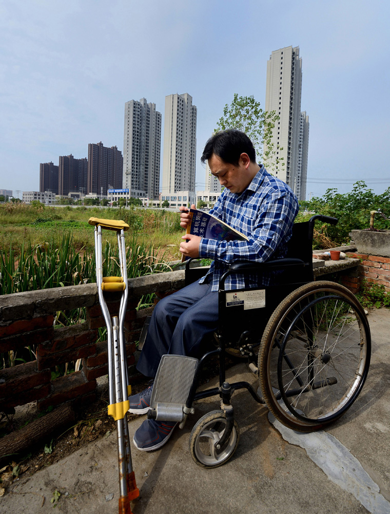 残疾人黄勇: 轮椅上的精彩人生