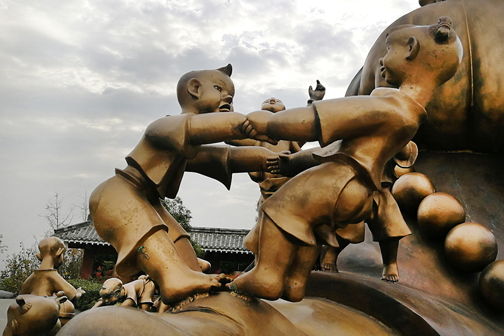 组照;百子戏弥勒