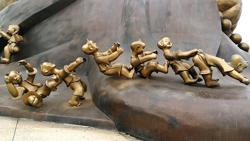 组照;百子戏弥勒